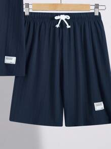 SHEIN 2pcs/Set Teen Boys Casual All-Match Solid Color Henley Collar Half Placket Short Sleeve Polo Shirt And Shorts Set