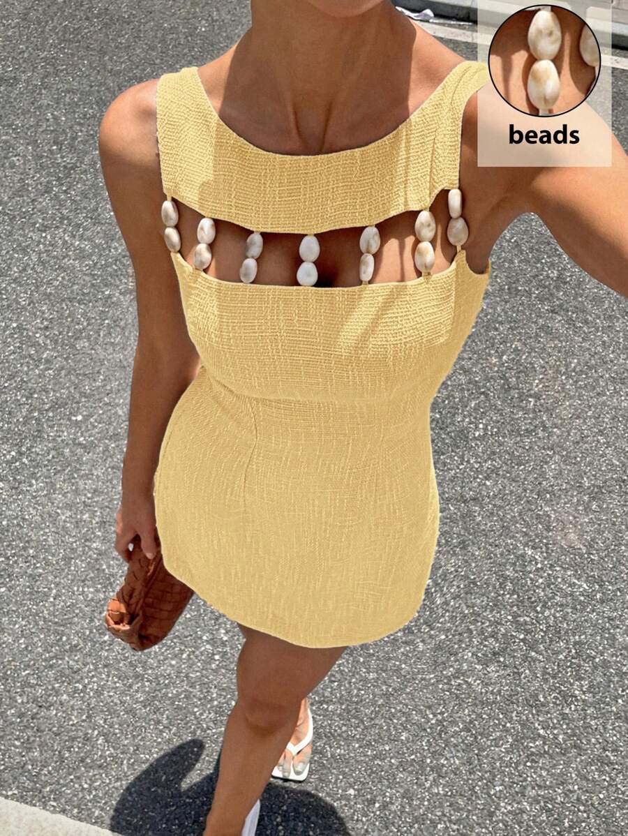 Siren Gaze Váy mini chữ A không tay đính hạt thiết kế mới mùa hè 2025 dành cho nữ - Màu vàng - Xem 1