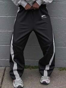 Tween 男童黑色街头拼色印花运动裤，舒适、时尚、百搭、面料柔软，非常适合日常、上学、旅行和户外活动