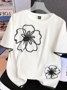 Regalyn Camiseta de cuello crew con manga corta, corte holgado y estampado floral para mujer, ideal para el verano