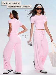 Eassivo Set de 2 piezas de ropa deportiva de verano para mujer, que incluye top de manga corta sólido y pantalones con nudo, conjunto de ropa deportiva de color rosa para hacer ejercicio - Rosa - Ver 1