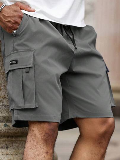 Manfinity Homme Pantalones cortos sueltos de talla grande para hombres con cintura ajustable y estampado de letras, cortos casuales lisos de verano hasta la rodilla, color gris claro, para regalo de esposo o novio