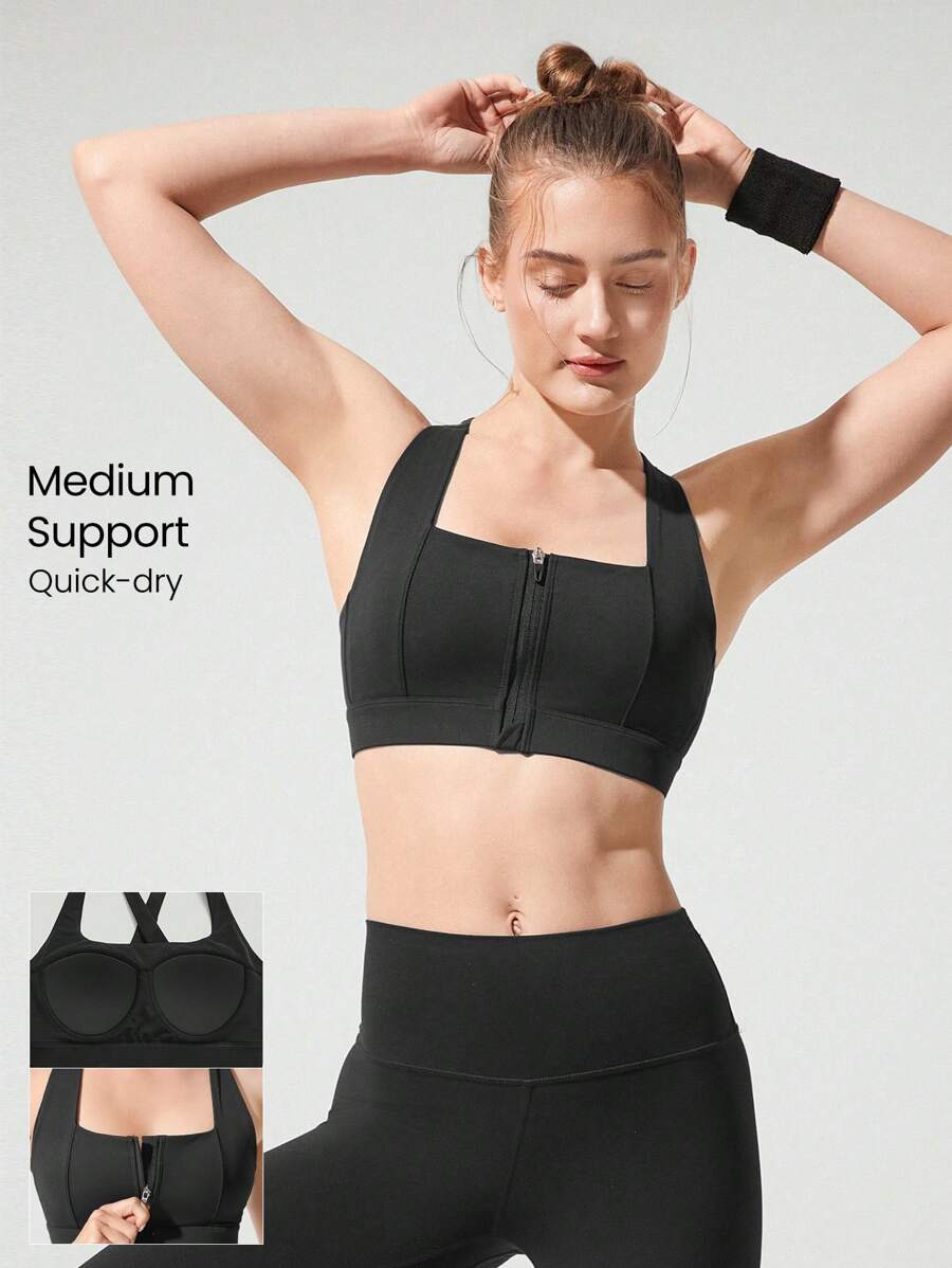GLOWMODE Sujetador deportivo con cuello cuadrado, espalda cruzada, tirantes ajustables, cremallera delantera y soporte medio para correr, trotar, entrenar y hacer ejercicio en el gimnasio - Negro - Ver 1