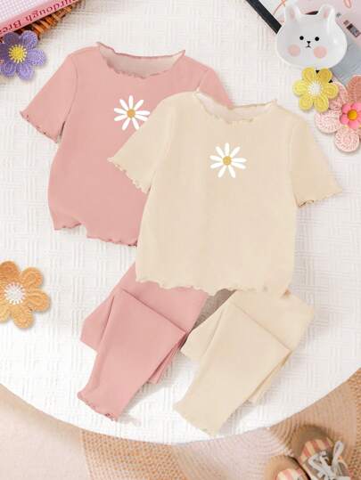 Set de 2 piezas de niña: camiseta con estampado de margaritas y pantalones largos con recorte de volantes en color contrastante, adecuado para el verano