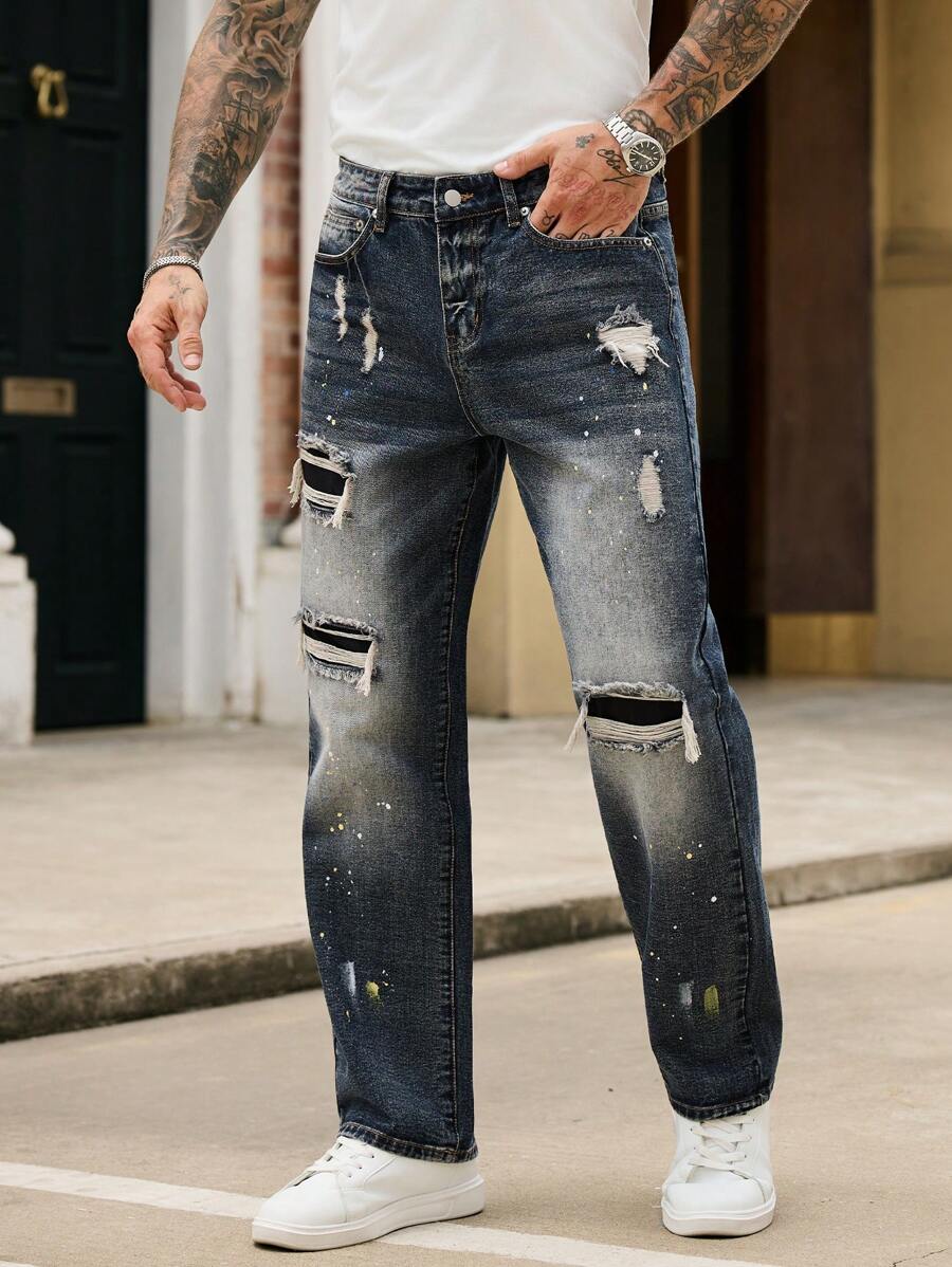 Manfinity Roughcore Men's Distressed Ripped Denim Jeans Casual Modern Style With Paint Splatter Detail And Zipper Fly - Blue - View 1