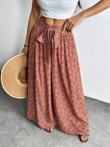 SHEIN PETITE Pantalones de pierna ancha para vacaciones con bolsillos y lazo frontal con estampado floral menudo para mujer