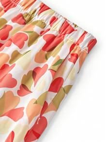 LUVLETTE Conjunto de pijama informal de top tipo camiseta con escote en V y pantalones, confeccionado en tela de satén sedoso con estampado de corazones