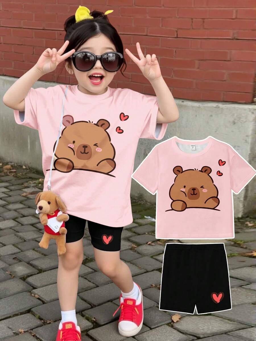 SHEIN Set de 2 piezas de camiseta y pantalones cortos con estampado de corazón y huella de pata, conjunto informal de verano para niña joven - Multicolor - Ver 1