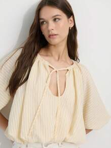 Nöista Soft Blush Butter Blouse With Puffed Long Sleeves And Bubble Hem. Features A Neck Tunnel With Bow Closure And No Zipper. Made From Lightweight, Breathable Fabric. Romantic, Airy, Feminine, Elegant, Versatile, Casual. - Apricot - View 5