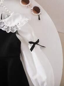SHEIN Babygirl 可爱学院风彼得潘领长袖蝴蝶结衬衫和黑色连衣裙 2 件套 - 黑與白 - 查看 3