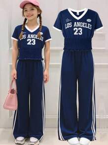SHEIN Explorewe Set de 2 piezas para niñas preadolescentes: Parte superior de béisbol con estampado de letras y pantalones anchos a rayas de verano casuales - Azul - Ver 5