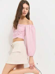 Nöista Top corto de hombros descubiertos rosa pastel con detalle fruncido en el frente y mangas abultadas de globo. Hecho de una tela ligera y transpirable para comodidad durante todo el día. Elegante, femenino, casual, primavera, verano, versátil, elegante. - Rosa - Ver 1