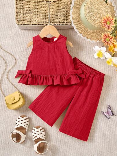 女婴纯色荷叶边上衣和裤子两件套，夏季度假