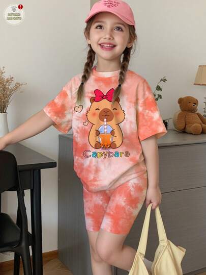SHEIN Set de 2 piezas: Camiseta informal con estampado tie-dye y letras, y shorts, adecuado para el verano para niñas jóvenes
