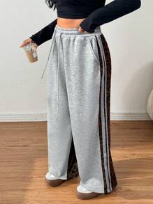 SHEIN EZwear Pantalones de talla grande con estampado de leopardo y patchwork, de moda, para otoño/invierno