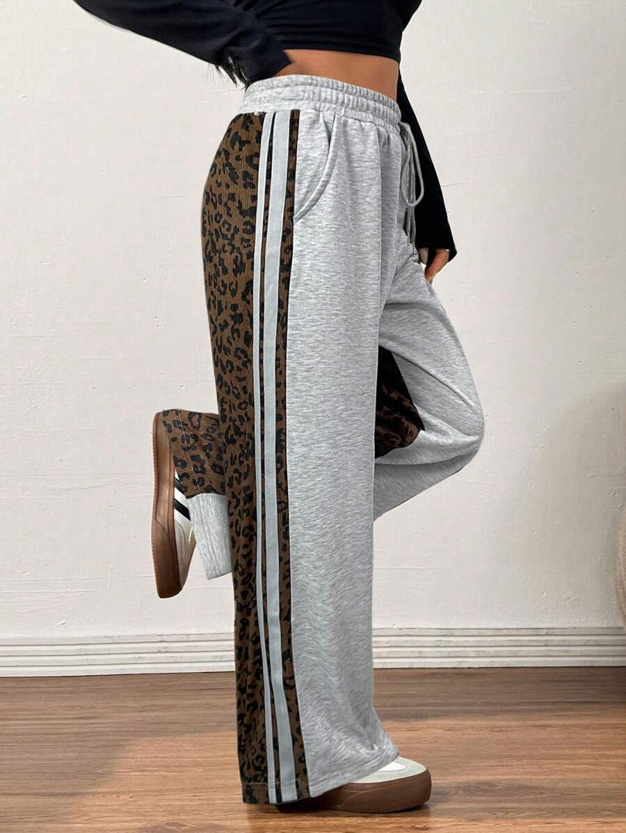 SHEIN EZwear Pantalones de talla grande con estampado de leopardo y patchwork, de moda, para otoño/invierno
