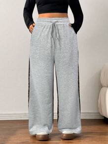 SHEIN EZwear Pantalones de talla grande con estampado de leopardo y patchwork, de moda, para otoño/invierno