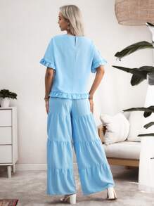 SHEIN Set Pakaian Hamil 2 Potong: Kemeja Kasual Lengan Pendek Kerah Bulat Polos dengan Hiasan Ruffle di Bagian Bawah + Celana Panjang Berlipit Berlapis dengan Pinggang Elastis Polos - Biru - View 2