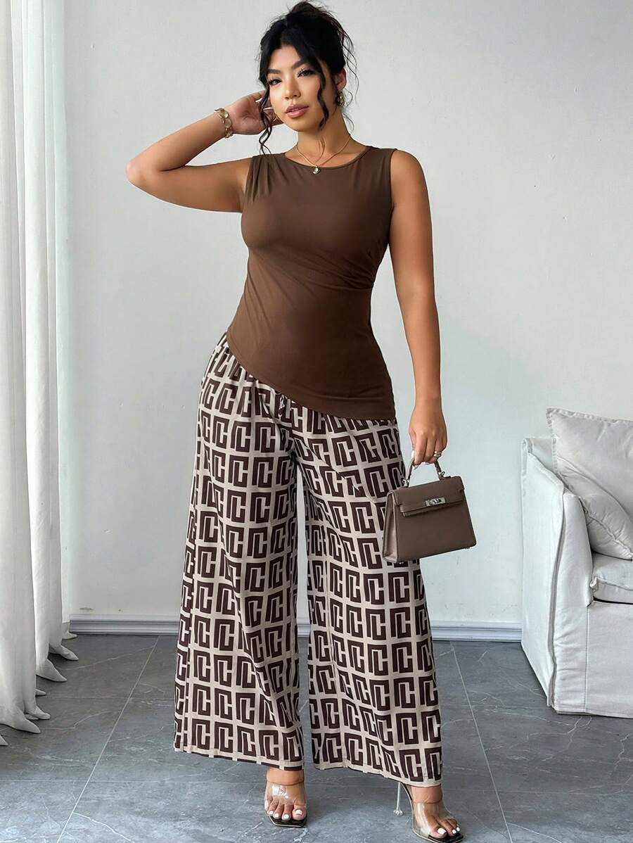 SHEIN Clasi Set da 2 pezzi, maglia in maglia morbida tinta unita con collo a giro e pantaloni casual a gamba ampia con stampa, ideale per taglia forte, per uscite e spostamenti quotidiani - Multicolore - Visualizzare 1