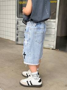 Pantalones cortos vaqueros desgastados con diseño de cruz gótica urbana de estilo callejero casual para niños jóvenes, cintura elástica, botón delantero, bajo deshilachado