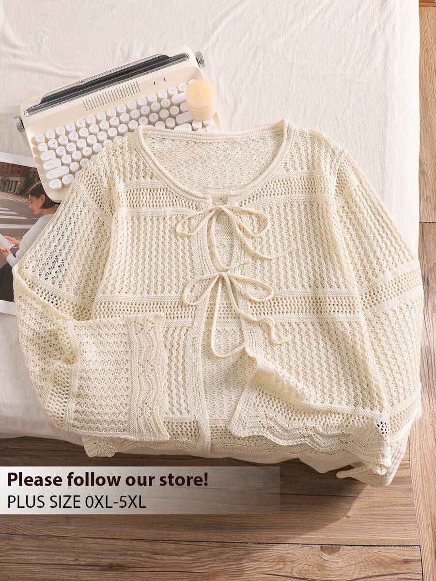 CosyJoli Große Größen bequeme lässige Urlaubs Häkel-Vorderseiten-Schleife Locker-Passform Damen apricotfarbene kurze gestrickte Strickjacke, für den Winter