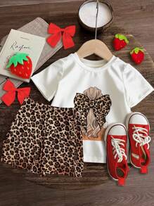 SHEIN Completo da ragazza vintage con stampa a pois leopardati e fiocco, composto da top a maniche corte e pantaloncini casual minimalisti, adatto per l'estate