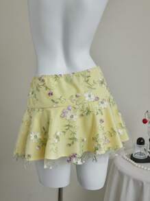 Elamini Jupe évasée à taille basse avec volant, style vacances bord de mer, style lady douce brodée de jaune, design européen et américain