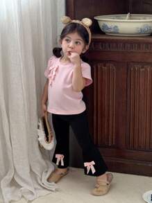 SHEIN 2 piezas Conjunto de ropa casual linda para niña bebé, blusa con manga corta con volantes y moño + pantalones largos acampanados, ropa dulce y versátil para niña bebé - Rosa - Ver 1