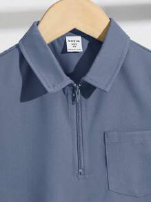 SHEIN 2pcs/Set Young Boy Military Green Half Open Collar Short Sleeve Jacket And Shorts Set, Casual Utility Pockets Suit For Summer Outgoing, Holiday, Sporty Everyday Wear