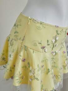 Elamini Jupe évasée à taille basse avec volant, style vacances bord de mer, style lady douce brodée de jaune, design européen et américain