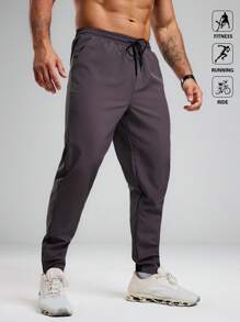 Manfinity Sport Polished 男士休闲纯色抽绳腰斜插口袋运动裤，适合健身、跑步、骑行等运动。 - 深灰色 - 查看 1