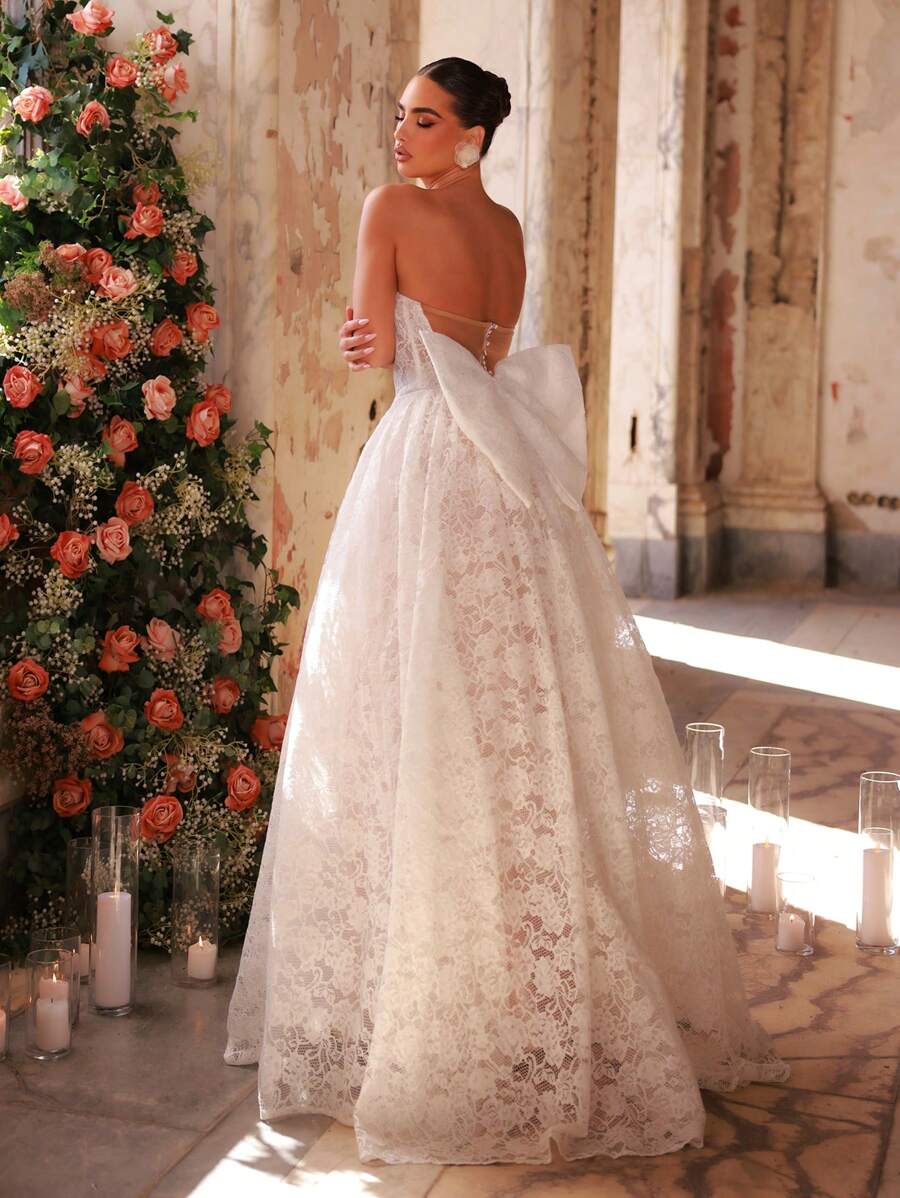 Glamrae Elegant Luxurious Strapless Big Bow Lace Fishtail Backless Extra Flaring Bridal Dress With Trailing, Suitable For Wedding, Single Party, Vacation, Ball, Honeymoon - Beige - View 1