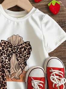 SHEIN Completo da ragazza vintage con stampa a pois leopardati e fiocco, composto da top a maniche corte e pantaloncini casual minimalisti, adatto per l'estate