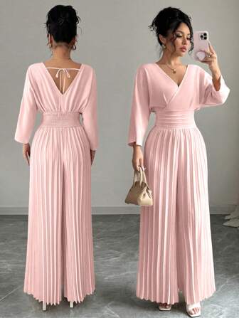 Rafferiza Damjumpsuit i enfärgad, minimalistisk, långärmad, vardagskläder