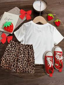SHEIN Completo da ragazza vintage con stampa a pois leopardati e fiocco, composto da top a maniche corte e pantaloncini casual minimalisti, adatto per l'estate