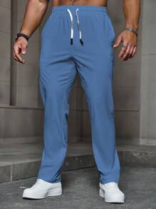 Manfinity Homme Pantalones casuales de verano para hombres de unicolor, con cintura elástica, cordón y bolsillos