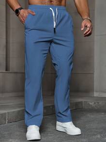 Manfinity Homme Pantalones casuales de verano para hombres de unicolor, con cintura elástica, cordón y bolsillos