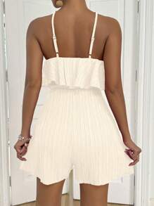 Breezaya Mono de mujer de unicolor de piqué con cuello halter, cintura con cordón y dobladillo con volantes