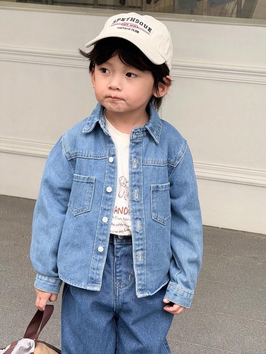 Unisex Young Kids Casual Vintage Classic Cotton Denim Shirt, Long-Sleeved Shirt In Cotton Denim. Turn-Down Collar, Snap Fasteners At Front, Open Chest Pockets, And Yoke. Drop Shoulders Light And Soft.