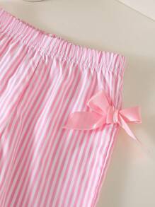 Set di abbigliamento per neonata in stile coreano casual e carino, con maglietta in maglia a scollo a V tinta unita e pantaloni lunghi a righe rosa in tessuto, abbigliamento esterno