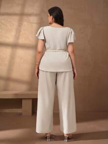 Chikora 2 piezas Conjunto de mujer talla grande - Top de manga corta con cuello en V y pantalones, unicolor elegante y sencillo