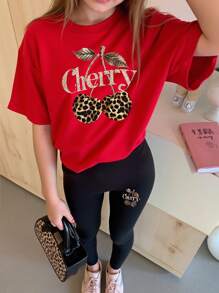 SHEIN Conjunto de 2 piezas de niña joven casual con camiseta de manga corta con estampado divertido de letras gráficas y leopardo de cereza, y leggings - Multicolor - Ver 4