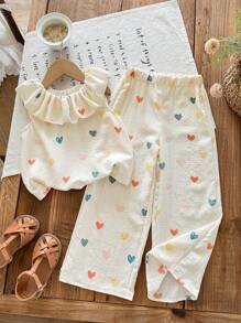 SHEIN LMoss Kids Set de 2 piezas con blusa de volantes con estampado floral pequeño y pantalones de corte relajado para niña joven - Albaricoque - Ver 4