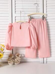 Conjunto de 2 piezas de parte superior de manga larga y pantalones para niña, parte superior rosa con manga abullonada y decoración de moño blanco, traje casual de alta gama cómodo para salidas, reuniones y uso diario