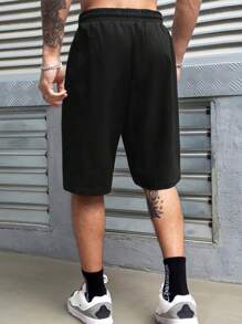 Manfinity EMRG Herren Muster Diagonale Schulter Lässig Shorts, minimalistisches Design für täglichen Männer Grafik Shorts - Schwarz - Übersicht 2