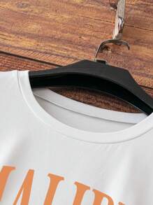 Camiseta casual de manga corta y ajuste ceñido con estampado gráfico de atardecer en la playa para mujer