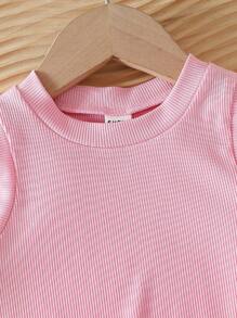 Set di abbigliamento per neonata in stile coreano casual e carino, con maglietta in maglia a scollo a V tinta unita e pantaloni lunghi a righe rosa in tessuto, abbigliamento esterno