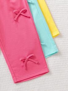 Set de 2 piezas para niñas pequeñas: camiseta de cuello redondo con estampado de dopamina colorido y pantalón de pierna recta con decoración de lazo, conjunto casual para el uso diario y deportes al aire libre, verano
