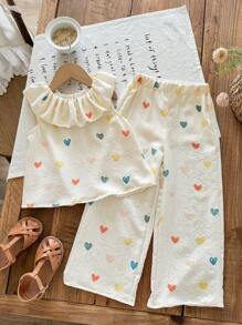 SHEIN LMoss Kids Set de 2 piezas con blusa de volantes con estampado floral pequeño y pantalones de corte relajado para niña joven - Albaricoque - Ver 7