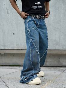 Manfinity EMRG Men's Pocketed Frayed Hem Relaxed Fit Bootcut Jeans - Medium Wash - View 1